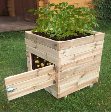 This Wooden Potato Planter Has A Built In Door For Easy Access To Your