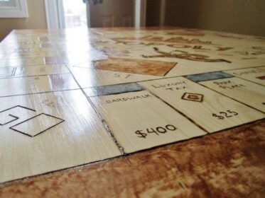 This Guy Turned His Plain Kitchen Table Into An Awesome Monopoly Board