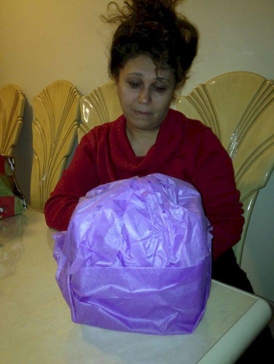 woman badly wrapped present