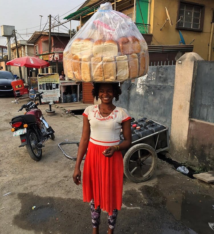 bread-seller-photobomb-modeling-contract-olajumoke-orisaguna-pro