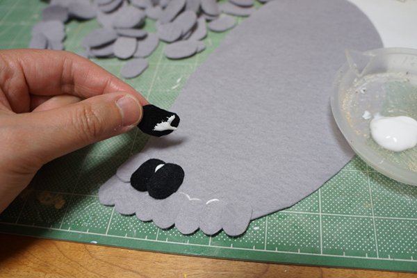 details being added to pigeon shoes