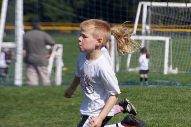 Photos You'll Have To Look Twice At boy with pony tail