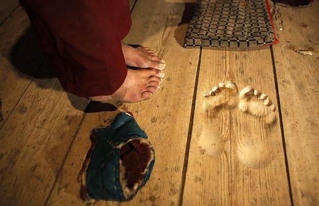 monk-feet-engraved-on-the-floor-time-shows-no-mercy