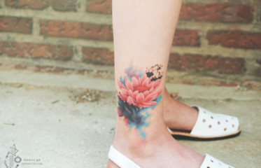 13 Tattoo Artists Share Some Of The Beautiful Flower Tattoos They Have Done