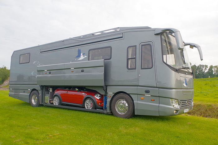 This Luxury Motorhome Has Its Own Built-In Garage For Your Car