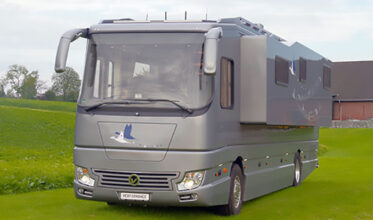This Luxury Motorhome Has Its Own Built-In Garage For Your Car