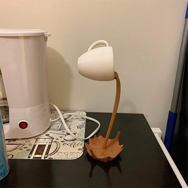 This Floating Coffee Cup Is A Stylish Addition To Anyone's Kitchen