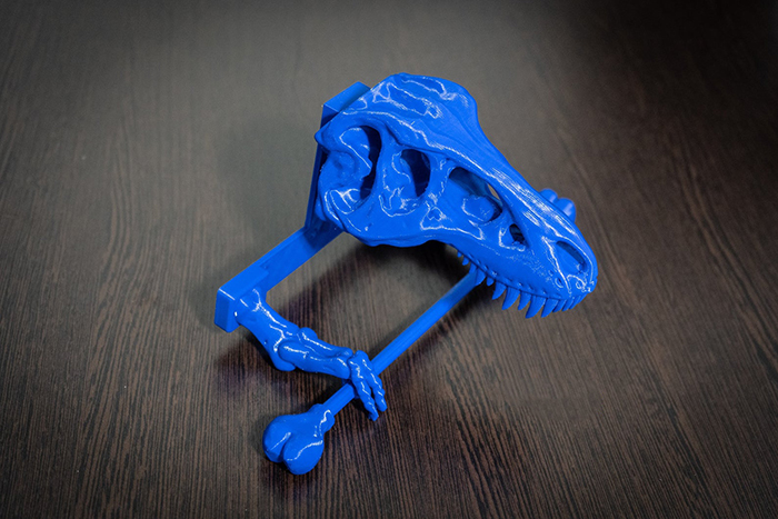 dinosaur skull tissue dispenser blue